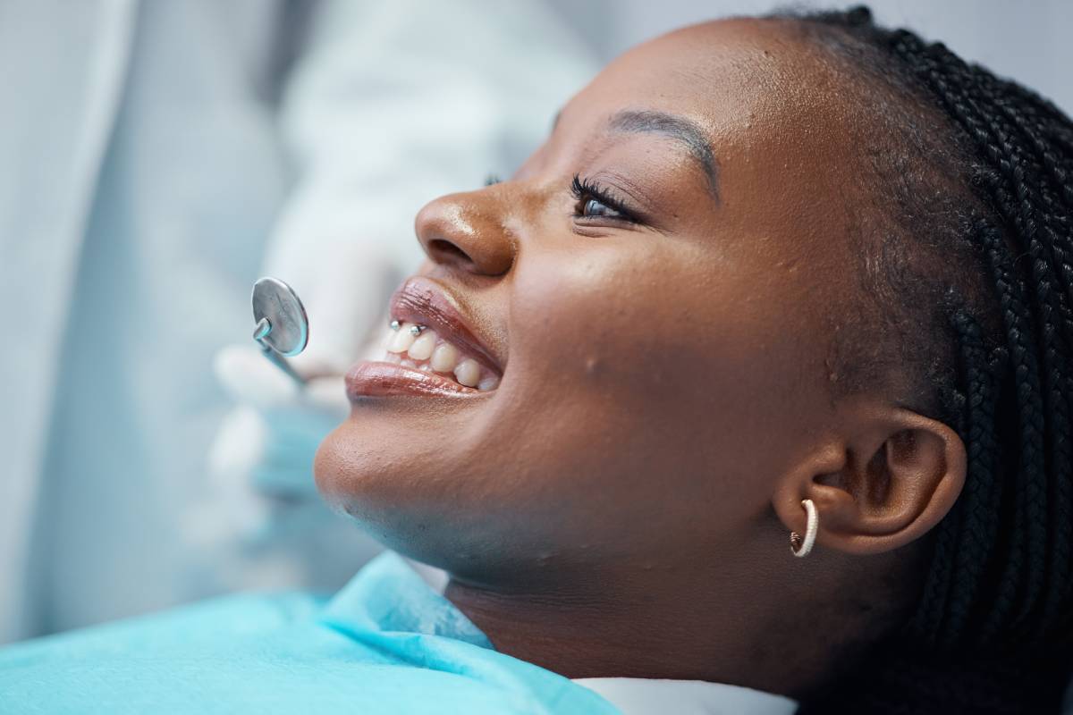 Closeup of woman during dental procedure.
